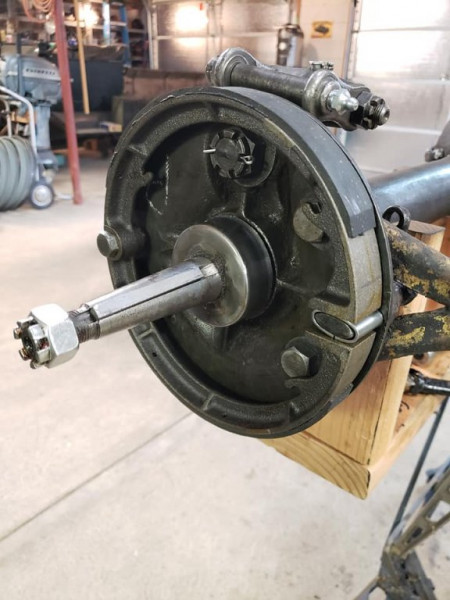 Another angle. A shim was added to the brake shoe cam to take up some of the wear on this original part. I think the show is still installed incorrectly in this photo...