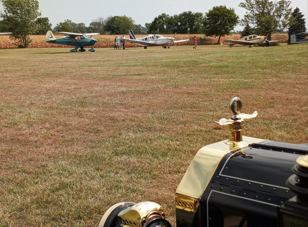 Overlooking Clara's hood while she awaits another turn giving rides.  Lots of planes not in view.
