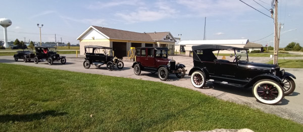 Central meet-up spot for half of us ..L-R:  Jim Riedy's '26; Art Mirtes' '23; Russ Herner's '14; my '25/'26; Tom Sloma's '26.
