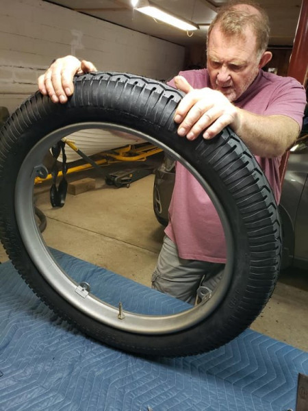 Checking the clincher bead seated in the rim.