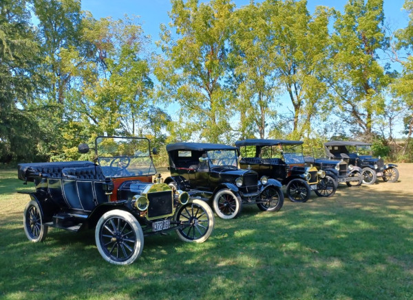 Lineup of 5 of the 6 cars at Russ's for a beverage after our tour.