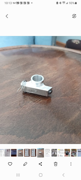 TW timer brush holder showing brush mounted inside prior to installation. The brush is spring loaded to always maintain good contact inside the commutator (timer)