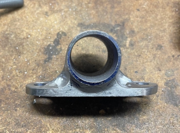 Bracket the attaches the remote handbrake assembly to the frame.  Milled from bar stock.