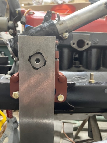 The bar with the hole cut in it.