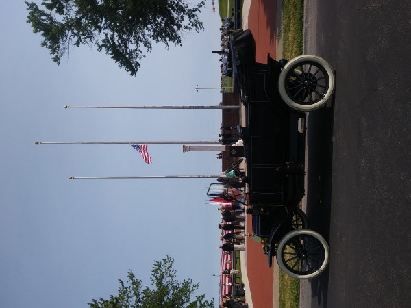 The permanent flag being raised with the band playing the anthem