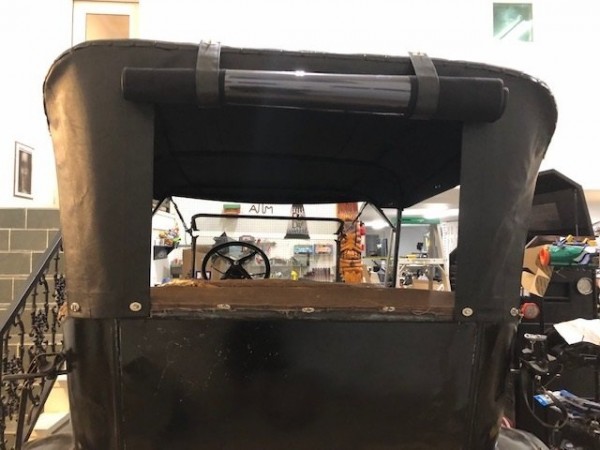 Rear curtain rolled up.