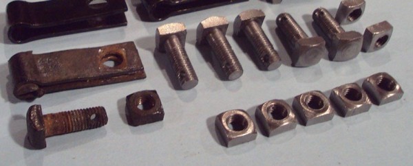 engine pans bolts and nuts close.jpg
