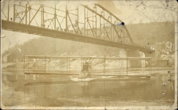 Plane under a bridge.jpg