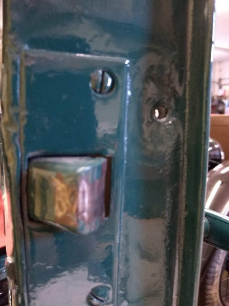 door lock screw hole.jpg