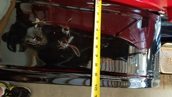 top of fender, width measurement.  yes the paint is peeling from some old body work around the bracket attachment