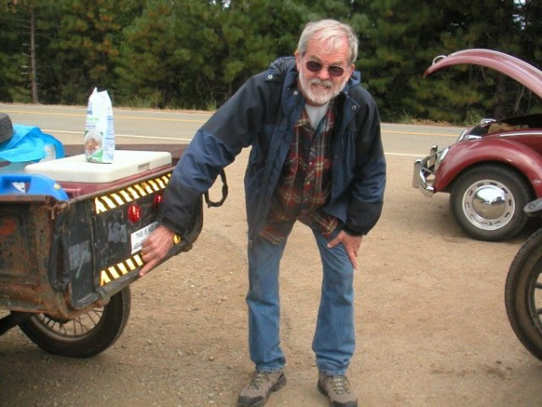 Lee pointing out the dime size mark his coupe left on Rusty.