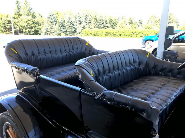 My recent re-upholstery job before I put the trim around the edges.  There is no back spring in the front seat, just thin, dense foam and the batting attached to the seat material-ignore the yellow arrows.