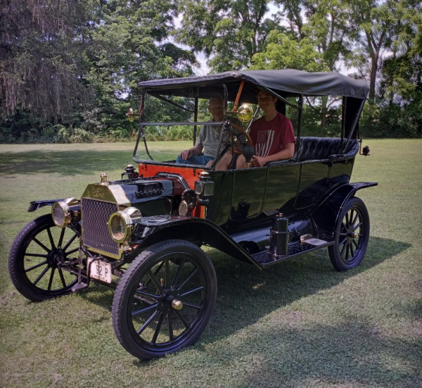Russ's &quot;student driver&quot; grandson at the wheel.